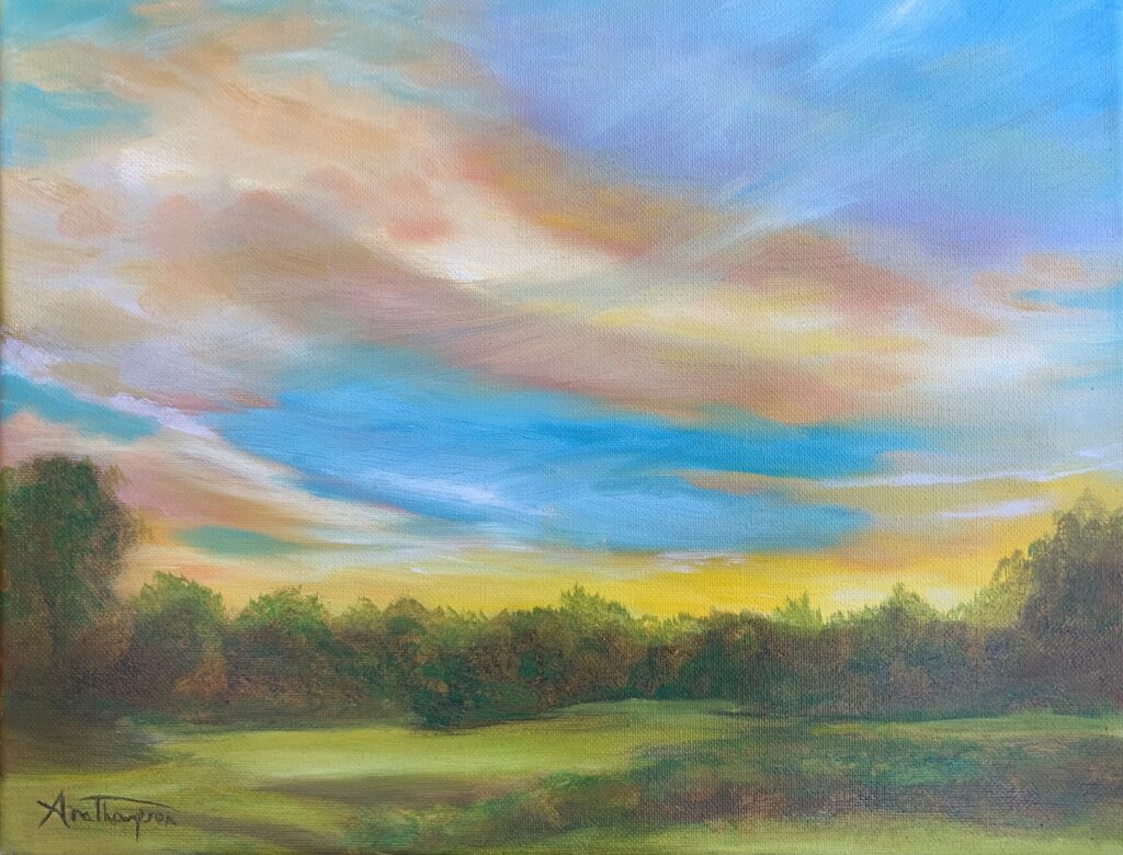 An Oil Painting of a sunset over a grassy plane. The sky is blue and pink, dusted with wispy clouds. The grass is lush and green. There are trees in the distance.