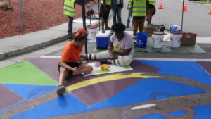 Photo of crosswalk being painted
