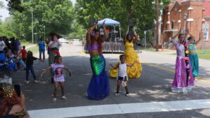 Brown Beauty Magic group dancing with East Augusta kids