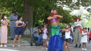 Brown Beauty Magic group dancing with East Augusta kids