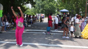 Felicia Rhodes of Magnolia Court Apartments dancing with residents of East Augusta