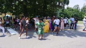 Residents of East Augusta dancing as a group