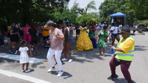 Residents of East Augusta dancing as a group