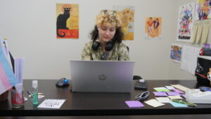 Galadra working at their desk