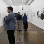 People looking at art in a gallery