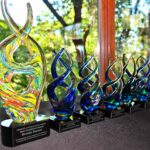 Colorful glass awards on a table